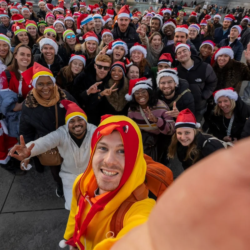 A group in Santa hats mid-hunt